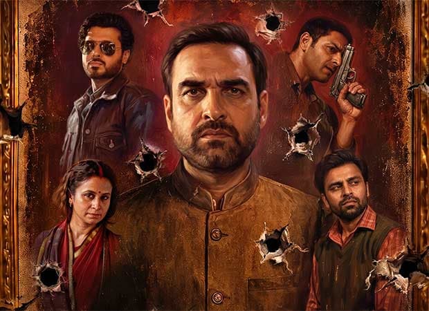 A poster or still from Mirzapur: The Movie featuring the lead cast in a tense confrontation scene.