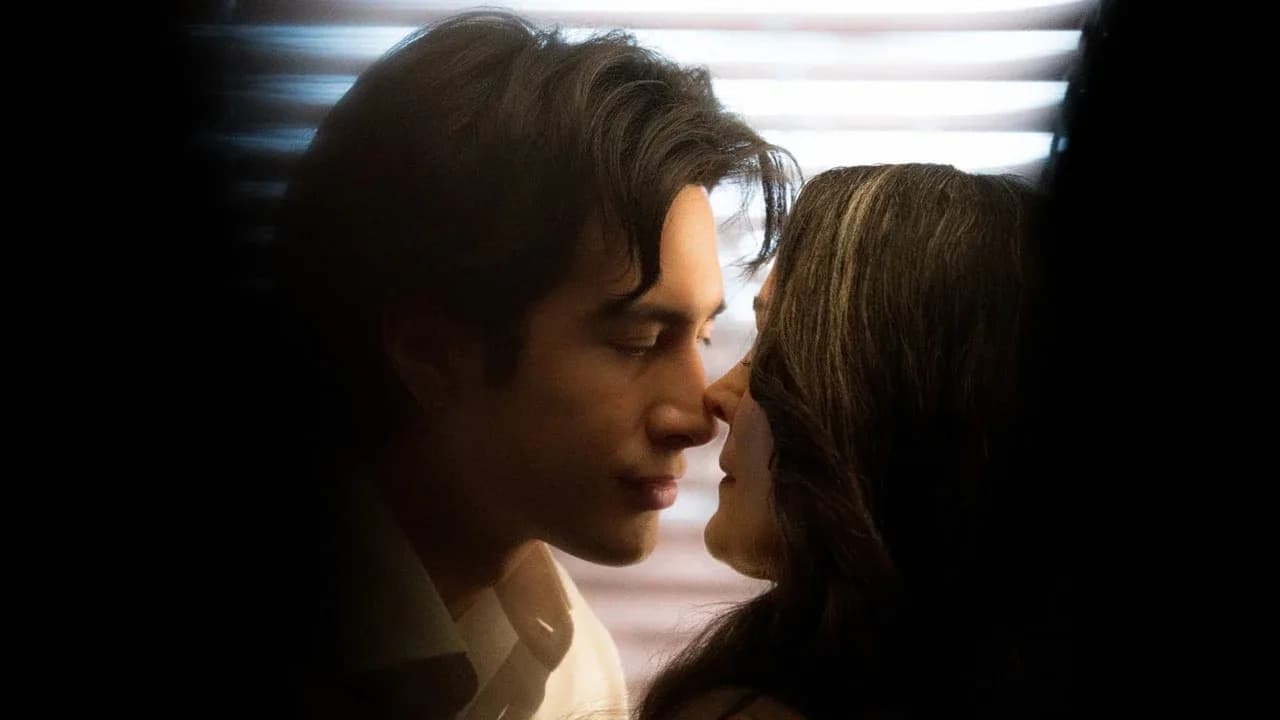 Hudson Williams and Carrie-Anne Moss locked in a close-up embrace from the Yaga trailer