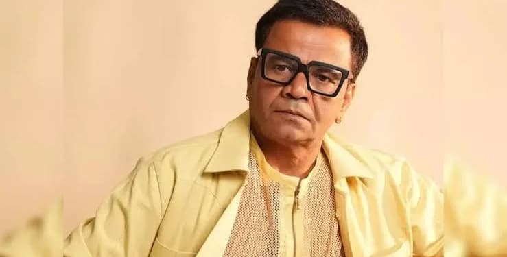 Rajpal Yadav walking out of court with documents in hand