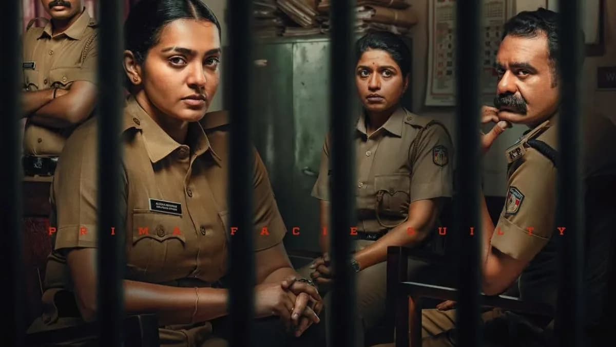 Parvathy Thiruvothu in a police uniform, staring ahead with intensity