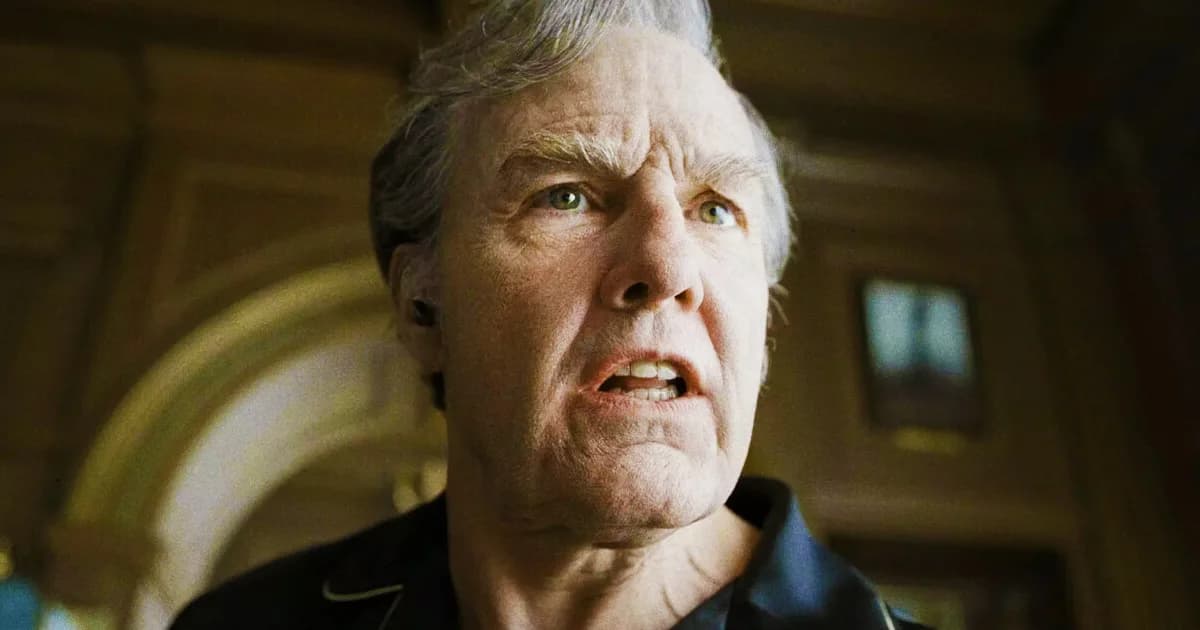 Tom Cruise as Digger Rockwell standing amid a chaotic, futuristic set with dramatic lighting