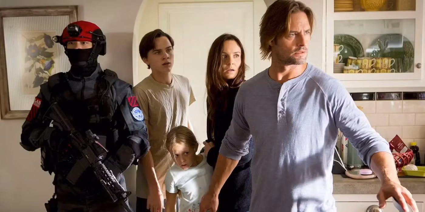 Josh Holloway as Will Bowman in a scene from the sci-fi series Colony, standing near a checkpoint wall