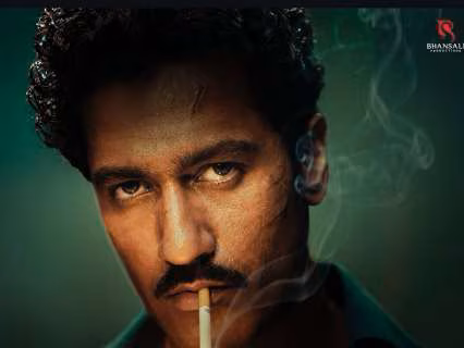Vicky Kaushal staring intensely at the camera, cigarette in mouth, lighter in hand, with the caption 'Nazre milengi, par hatengi nahi' overlaid.