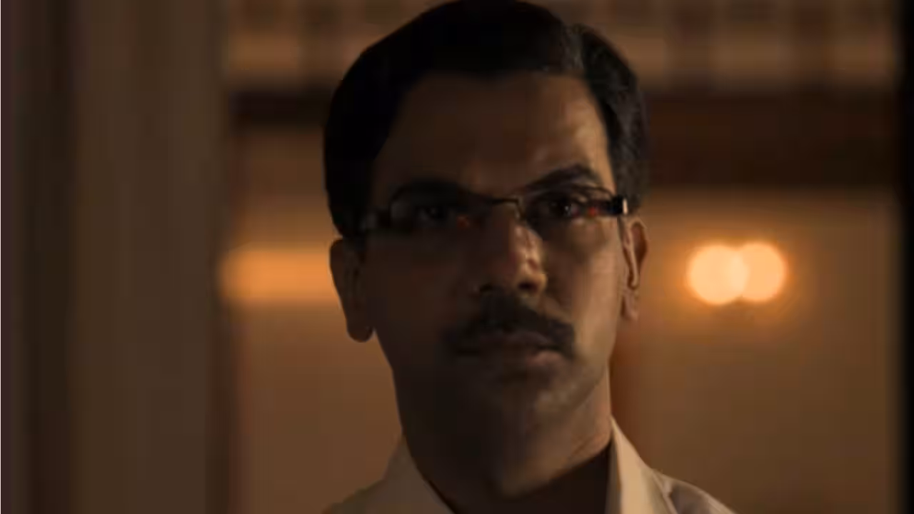 Rajkummar Rao in a courtroom scene, intense expression, dark suit, mid-speech