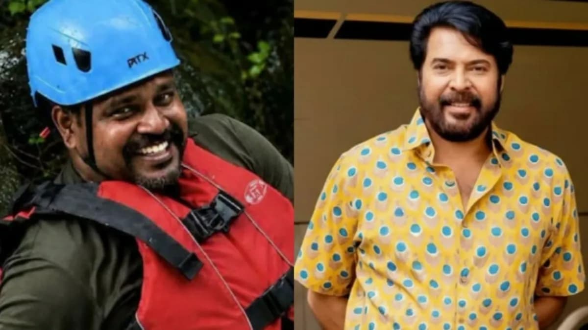 Malayalam actor Mammootty at a public event, smiling and dressed in formal attire.
