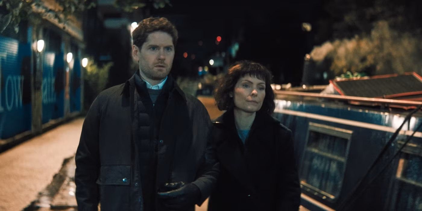 Kyle Soller as Jim in a rain-soaked alley, face half-lit, eyes wide with realization