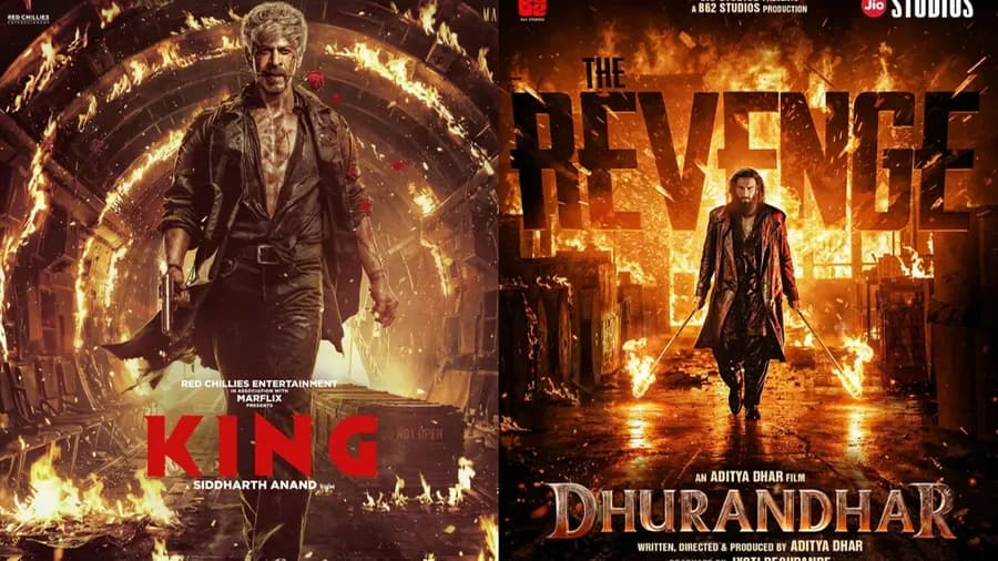 Shah Rukh Khan in a bloodied, intense look, walking out of a fiery tunnel, holding a gun.
