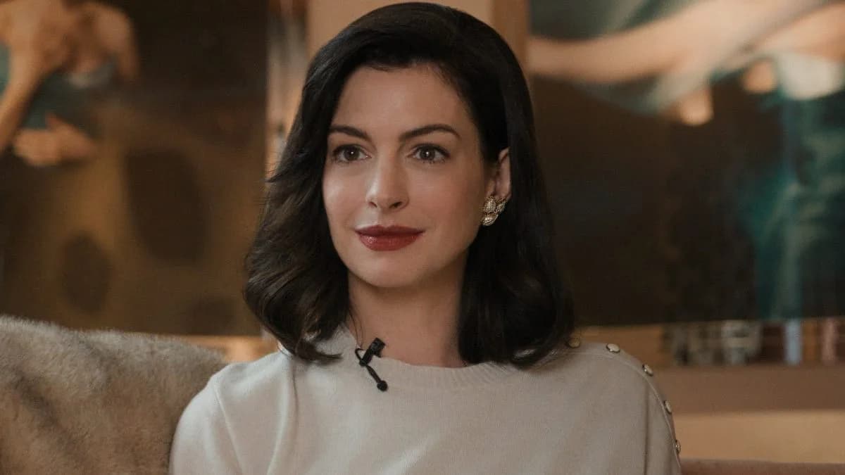 A poster for Verity featuring Anne Hathaway in a dark, intense pose against a red background.