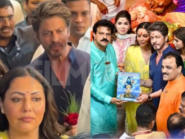 Shah Rukh Khan in a blue kurta standing with Gauri and Suhana at the Lalbaugcha Raja pandal, offering prayers to the Ganpati idol.
