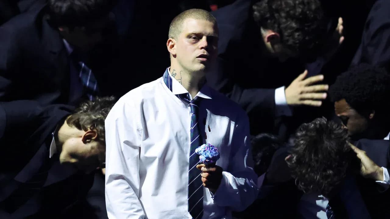 Yung Lean smashing a Moonman trophy on stage during his Storm performance at the 2026 MTV Video Music Awards