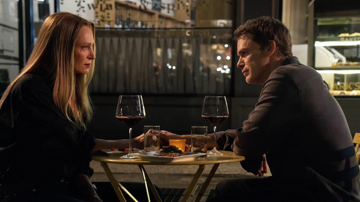 Michael C. Hall as Dexter Morgan in a promotional still for Dexter: Resurrection season 2, standing in a dimly lit New York setting.