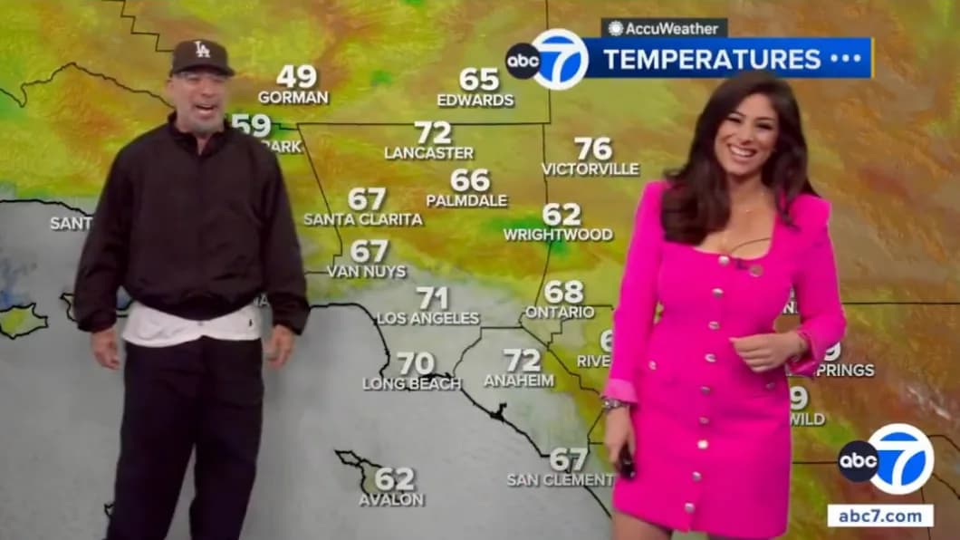 Jo Koy standing beside ABC 7 weather presenter Niku Kazori during a live morning forecast in Los Angeles