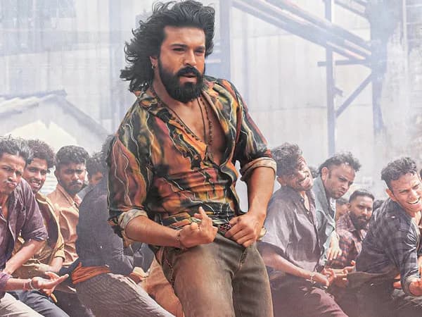 Ram Charan in a rustic village setting, holding a cricket bat, looking determined.