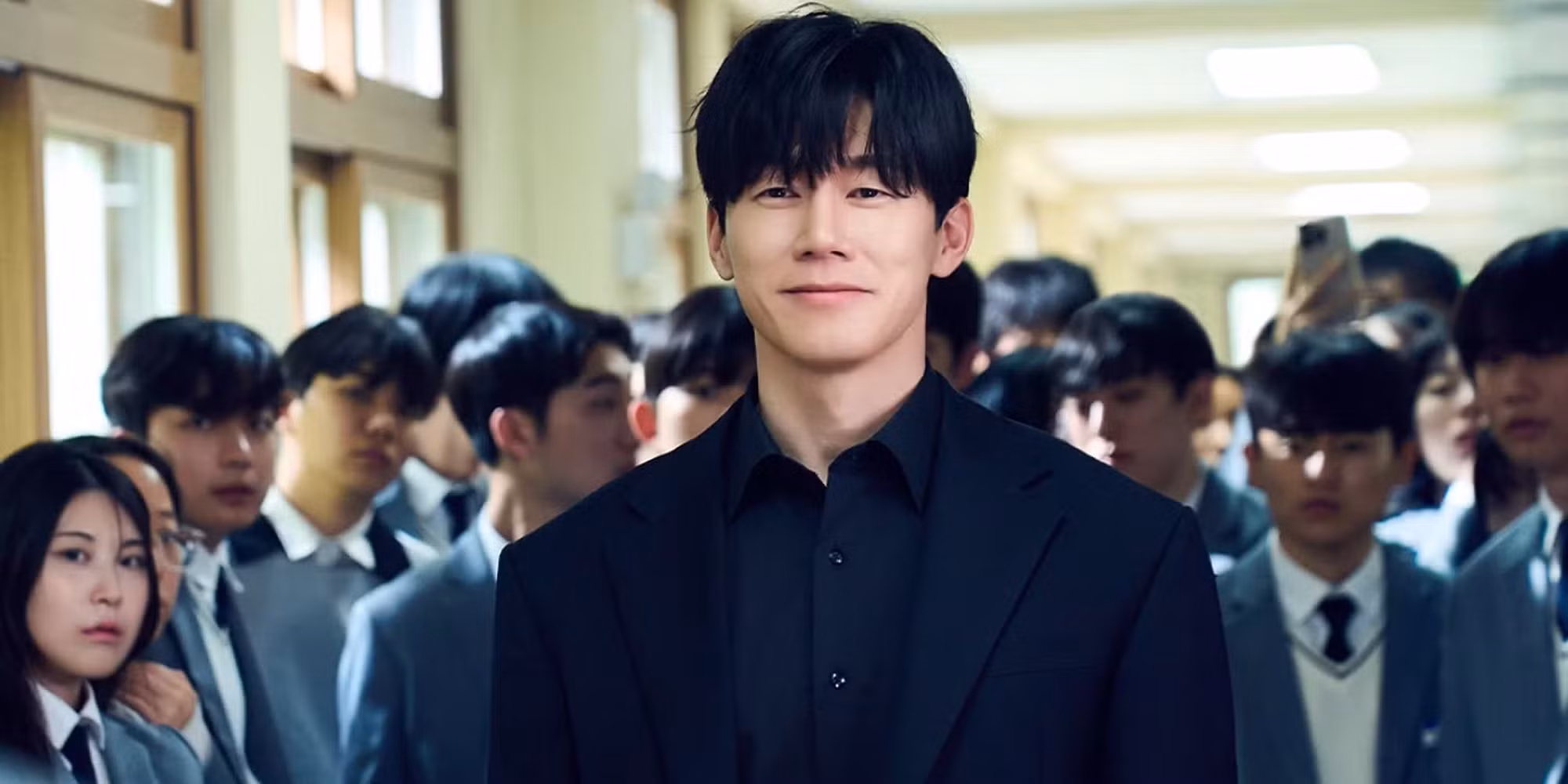 A promotional image of Korean high school students in uniform standing in a dimly lit classroom, evoking the zombie outbreak series All of Us Are Dead.