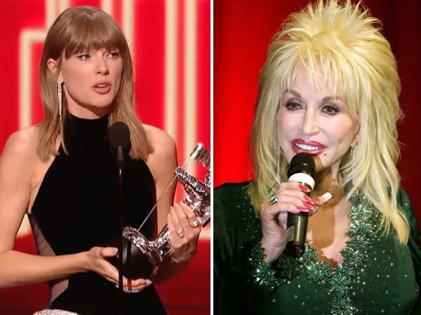 Taylor Swift holding a VMA trophy on stage, with a photo of Dolly Parton displayed in the background.