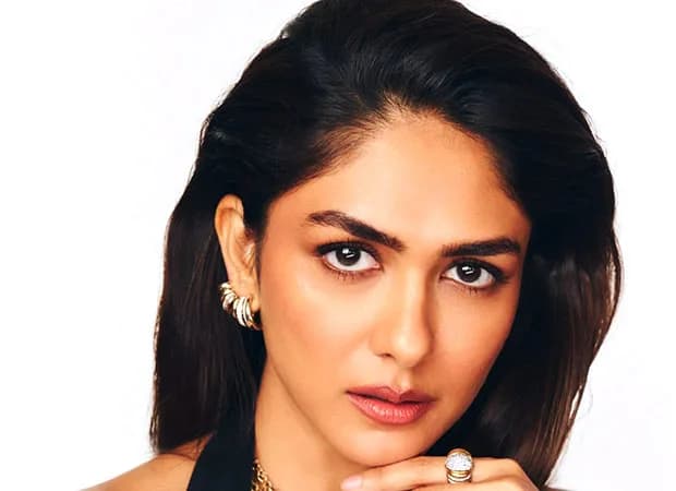 Mrunal Thakur stepping onto the runway at Paris Fashion Week 2026, wearing a sleek couture ensemble