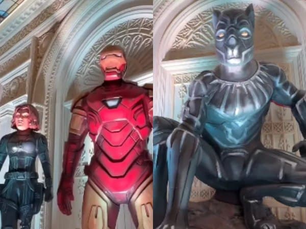 Marvel superhero figures including Iron Man, Captain America and Hulk displayed alongside Ganpati idol decorations at a Mumbai pandal