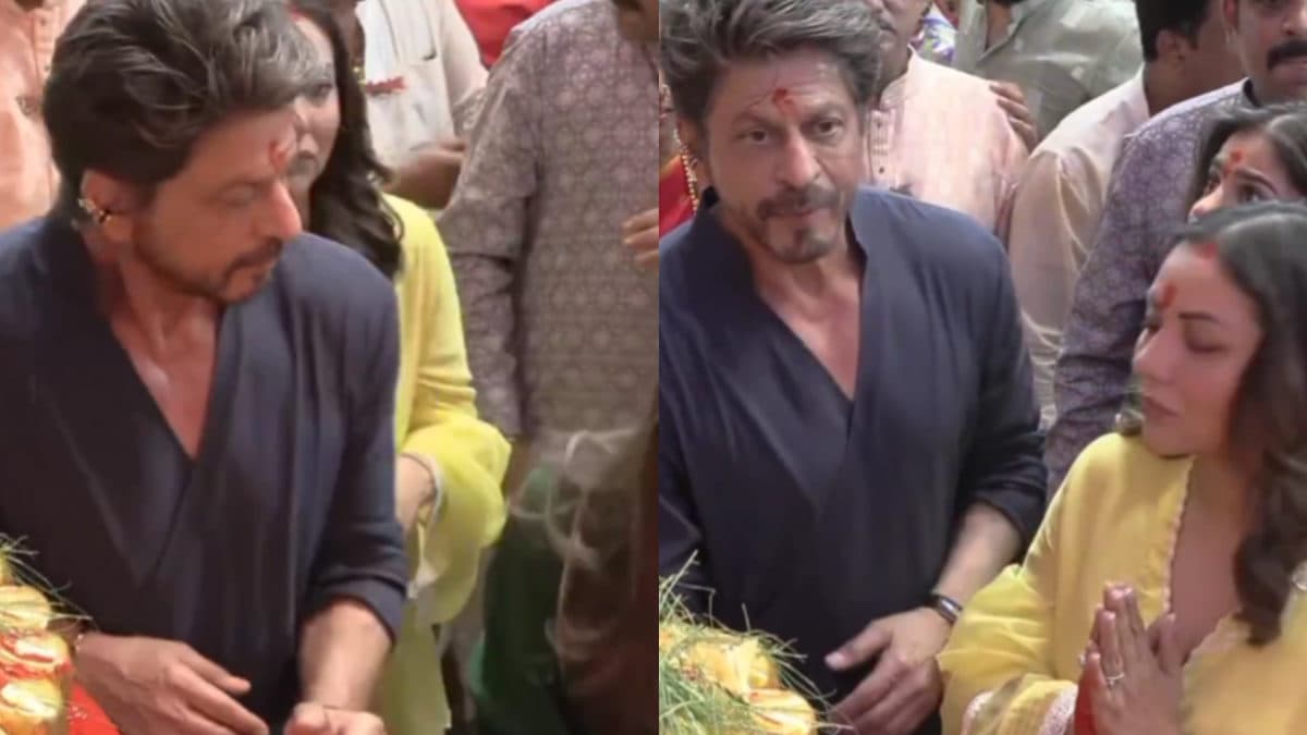 Shah Rukh Khan in a navy blue kurta with Gauri Khan and Suhana Khan at Lalbaugcha Raja pandal during Ganesh Chaturthi