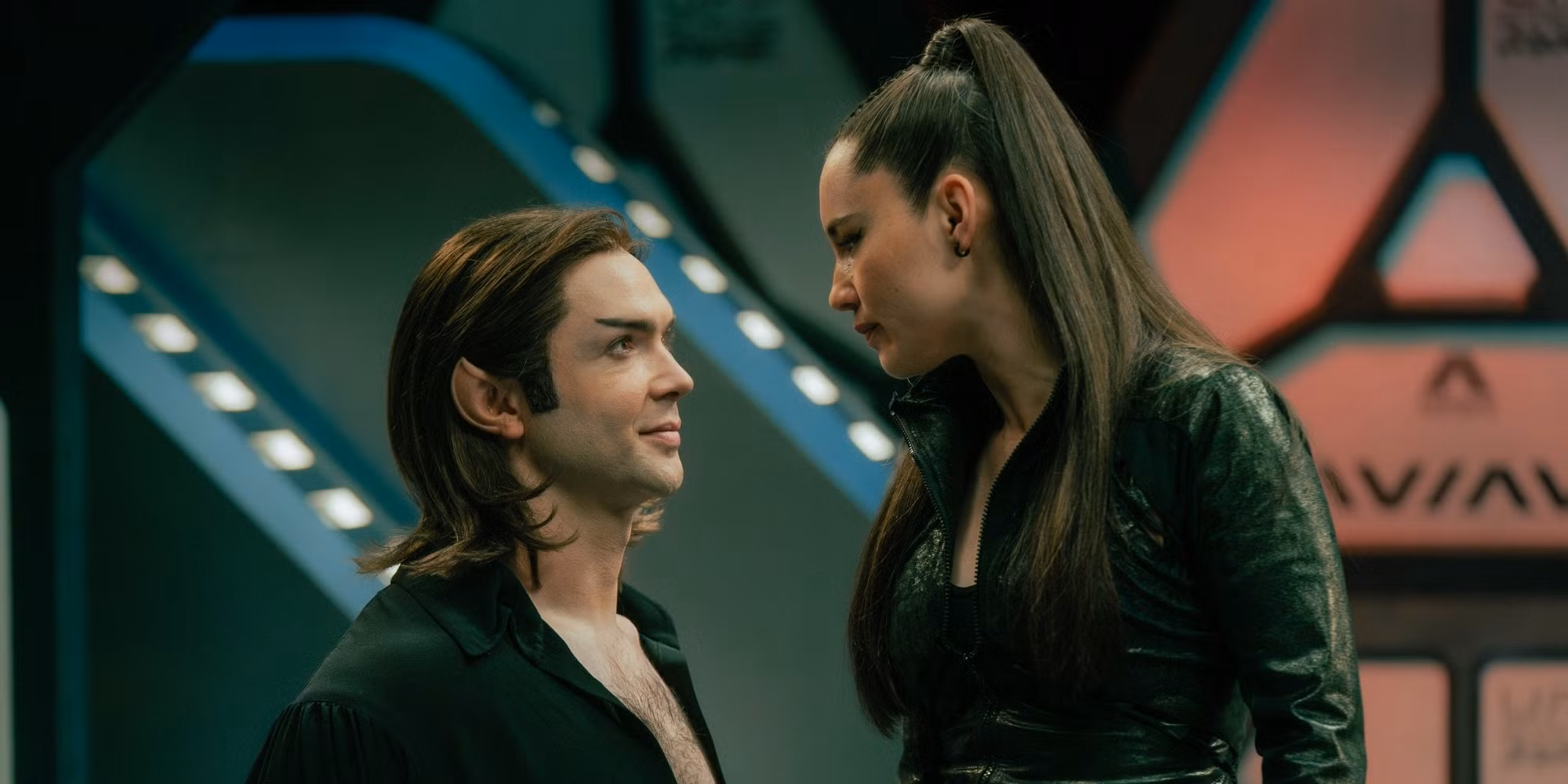 Christina Chong and Ethan Peck on stage at a Star Trek: Strange New Worlds panel discussing the show's soap opera episode.