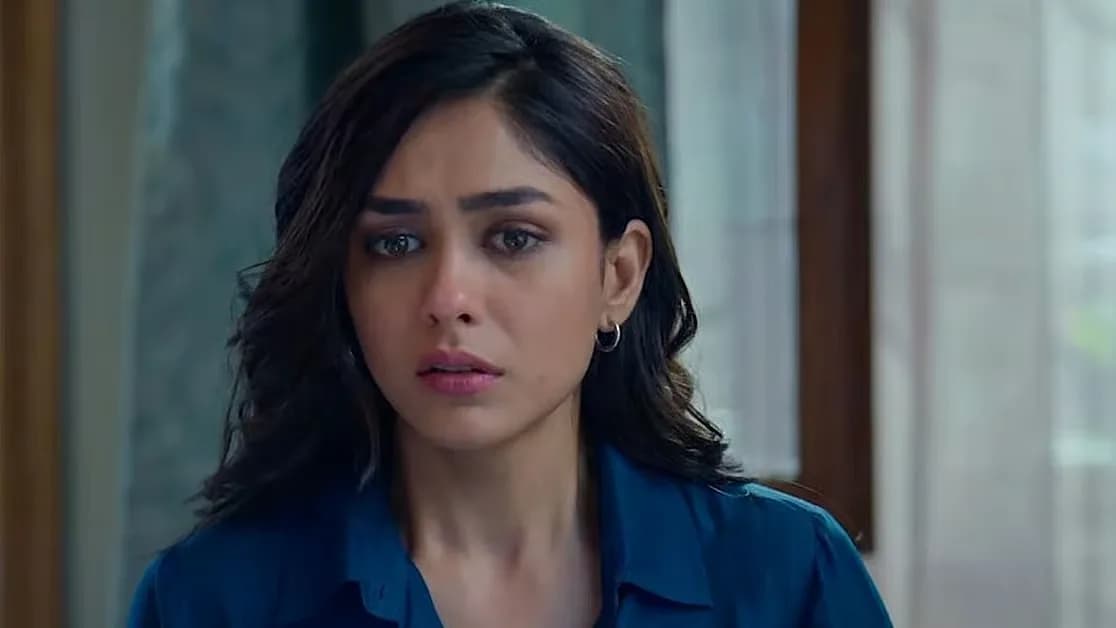 Mrunal Thakur in a dramatic scene from 'Pooja Meri Jaan', looking conflicted and vulnerable.