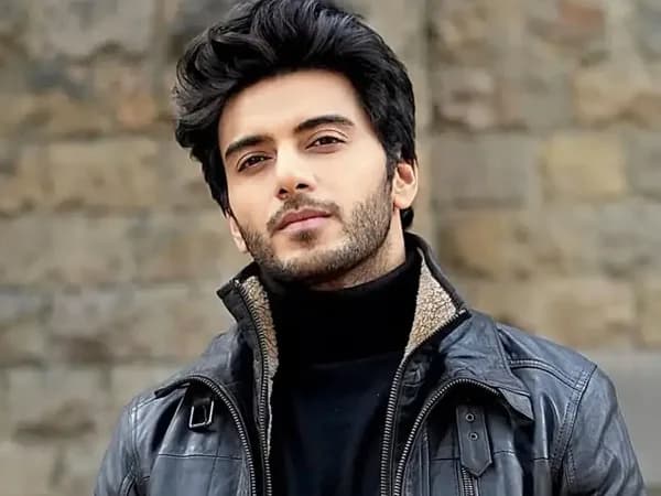 Vikram Singh Chauhan in a black turtleneck, looking directly into the camera, expression serious yet reflective.