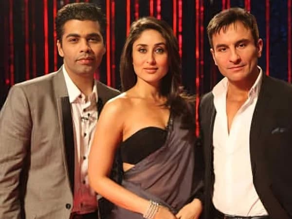 Kareena Kapoor Khan and Saif Ali Khan seated together on the Koffee With Karan couch set