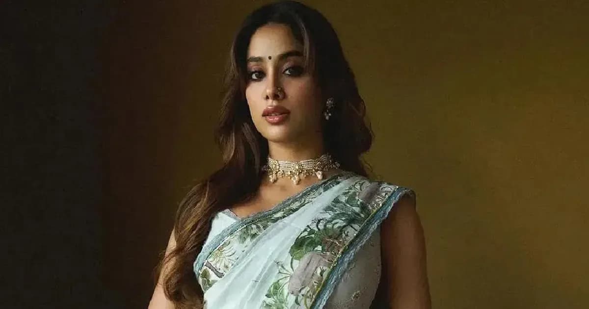 A blurred image of Janhvi Kapoor with a red 'AI' stamp overlay, symbolizing digital manipulation.