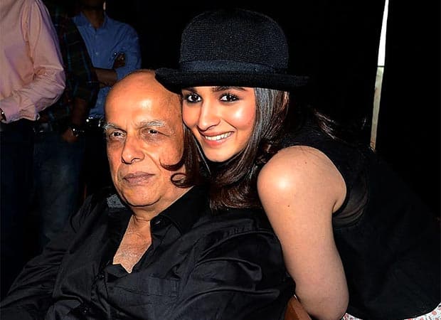 Alia Bhatt speaking during an interview after a film screening, smiling while talking about her father Mahesh Bhatt.