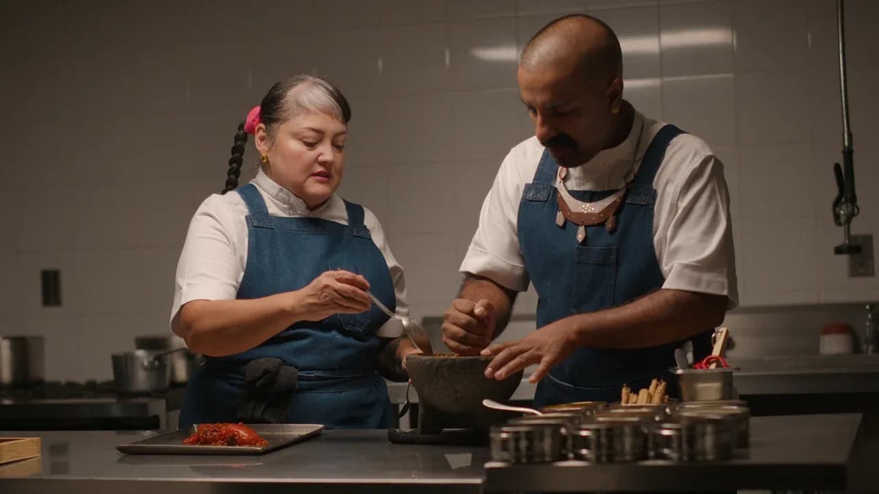 A chef plating an elaborate dish in a professional kitchen, styled to evoke the Chef's Table documentary series.