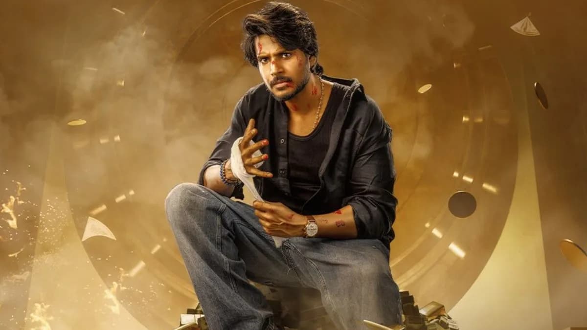 A still from the movie Sigma featuring Sundeep Kishan in a dramatic pose.
