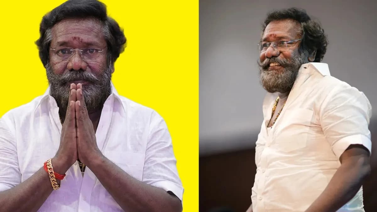 Tamil actor Karunas smiling during a public event