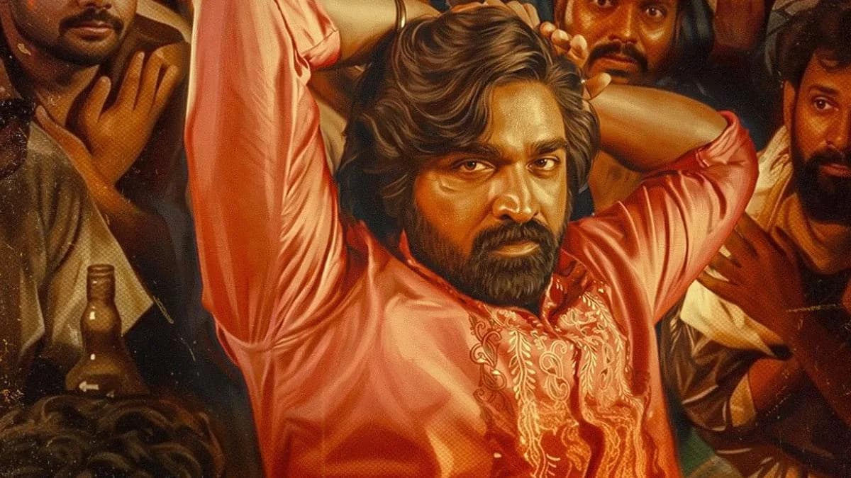 Vijay Sethupathi in a tense scene from Baththa, standing in a dimly lit school corridor.