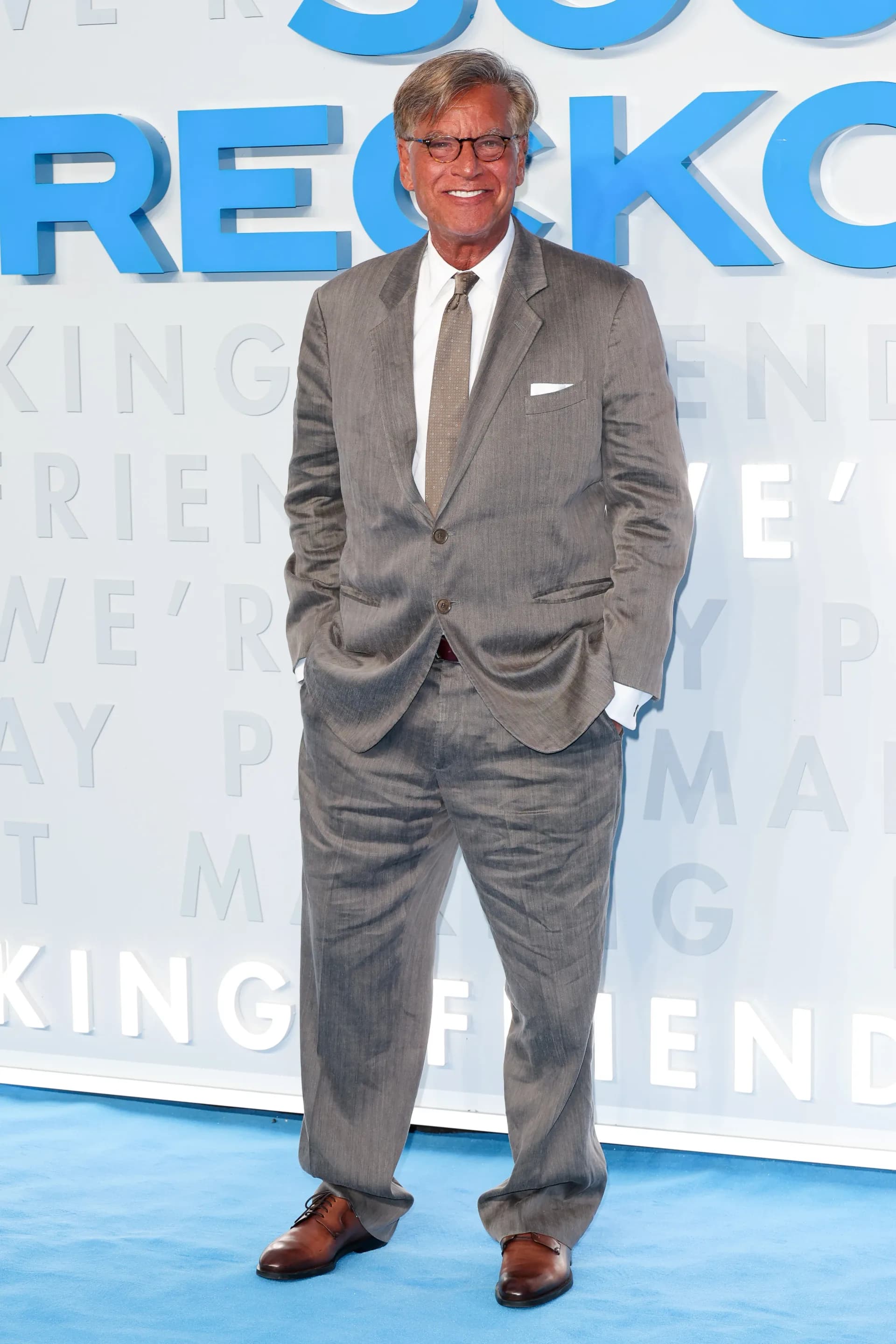 Aaron Sorkin at the London gala for The Social Reckoning, showing his overly bronzed complexion.