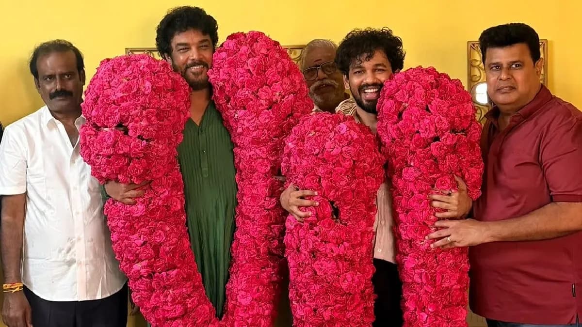 Hiphop Tamizha Adhi and the Meesaya Murukku 2 team on stage at a thank-you event with cake for Khushbu Sundar's birthday