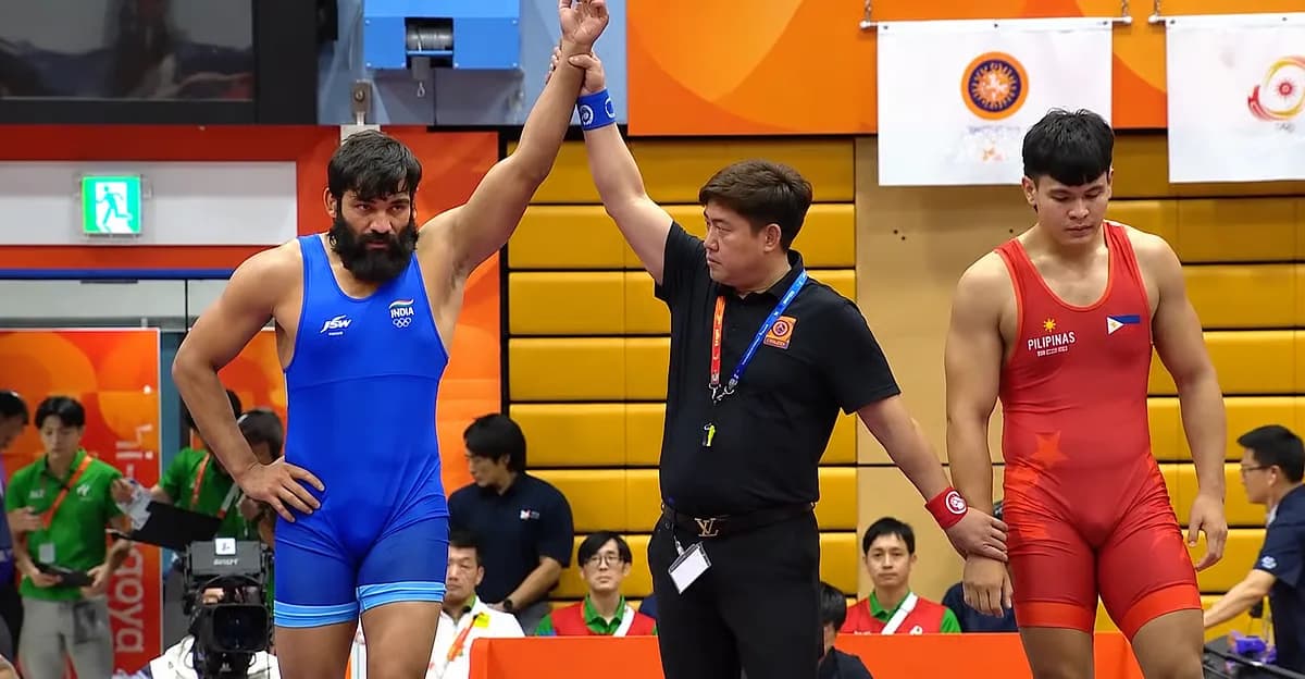 Indian wrestler Sunil Kumar competing in the Greco-Roman 87kg category at the Asian Games 2026 in Aichi-Nagoya, Japan.