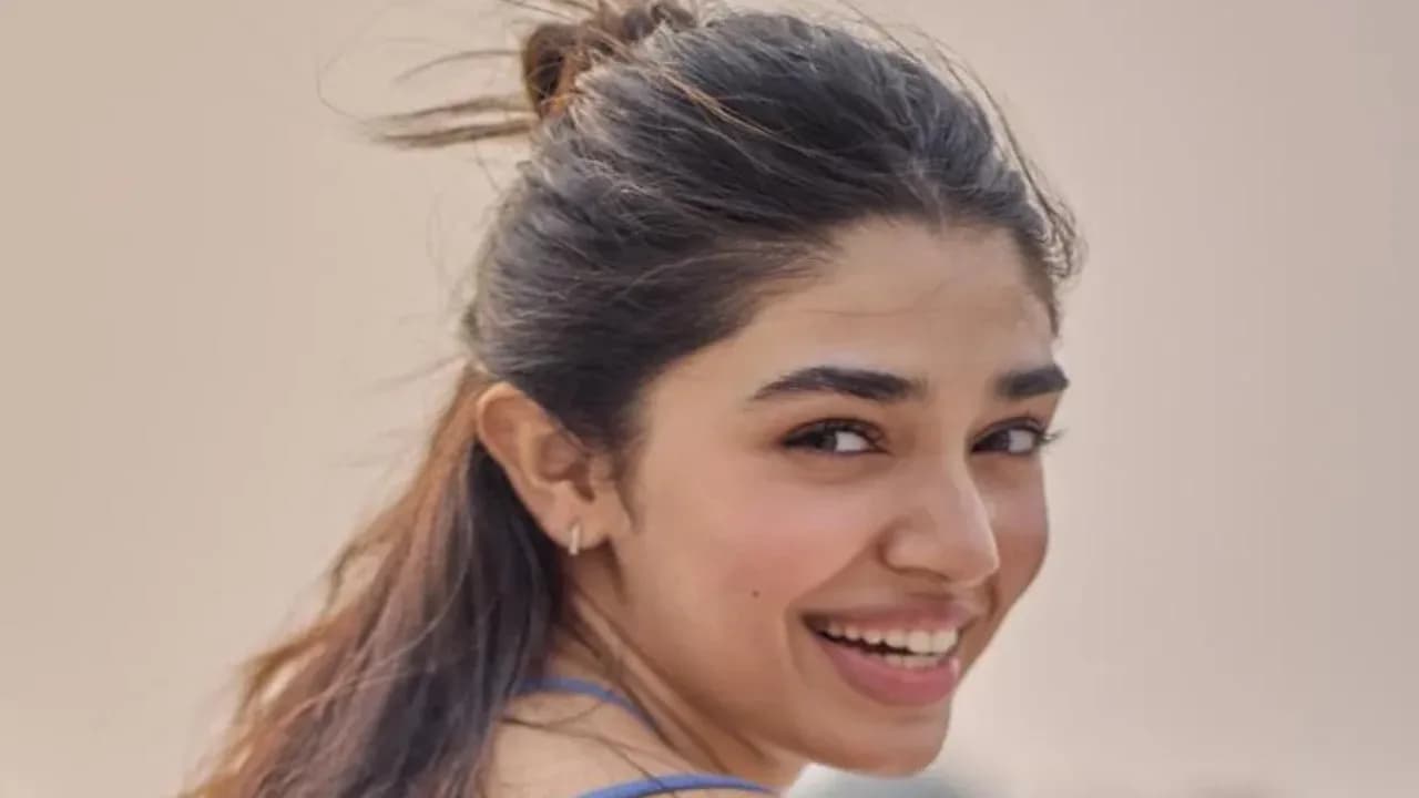 Krithi Shetty in a soft-focus portrait, looking ahead.