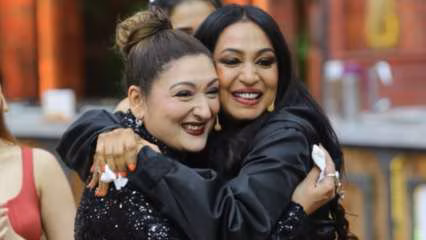 Kashmera Shah at a public event, smiling for photographers