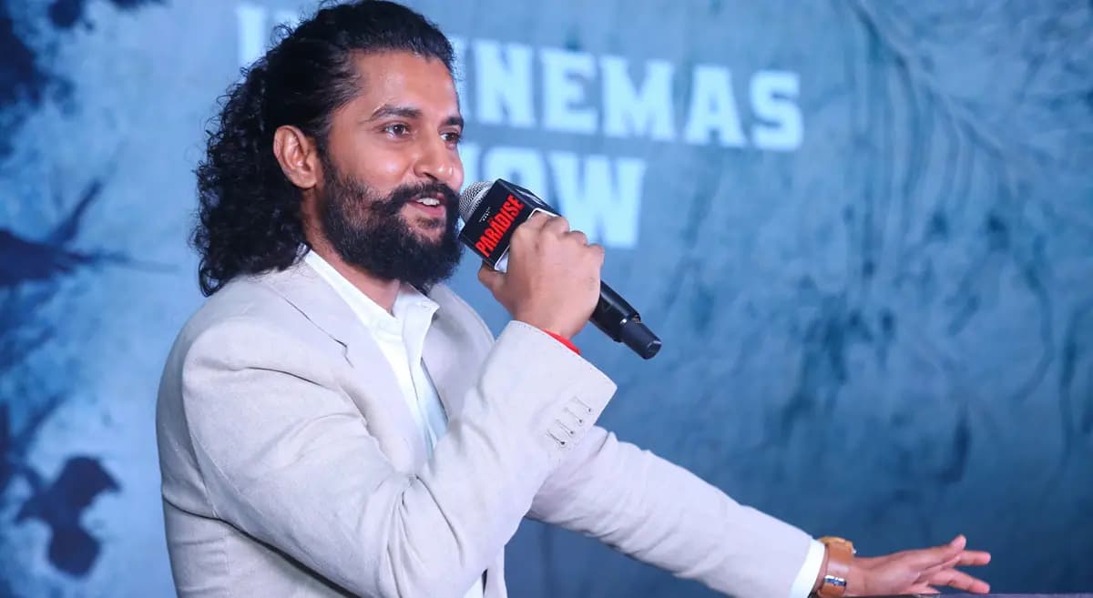 Nani speaking at a media interaction for The Paradise, addressing reporters.