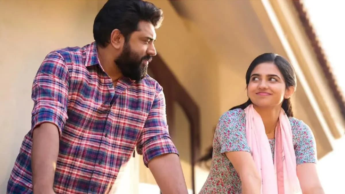 A still from Bethlehem Kudumba Unit showing Nivin Pauly and Mamitha Baiju in a quiet, intimate moment