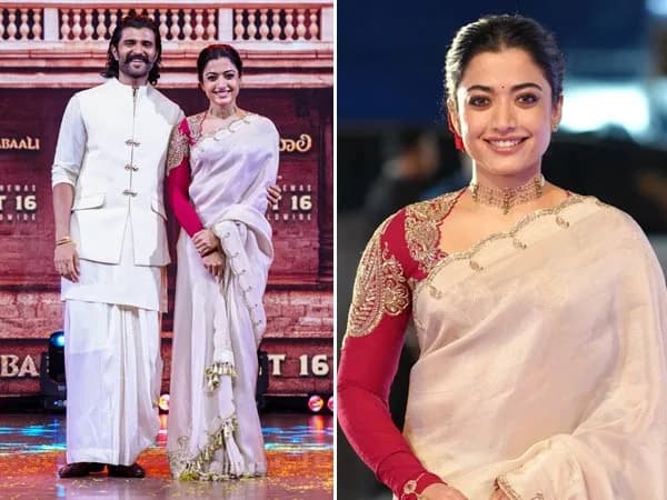 Vijay Deverakonda and Rashmika Mandanna at the Ranabaali pre-release event, dressed in coordinated white outfits