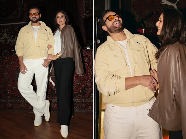 Saif Ali Khan and Kareena Kapoor Khan posing together at a PUMA event, both dressed in white T-shirts with contrasting leather jackets.