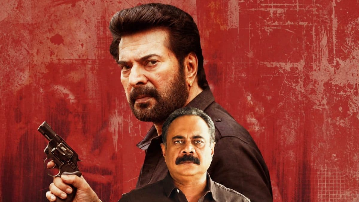Mammootty in his Karikkamuri Shanmughan cop character alongside Prakash Varma in a still from Law & Order