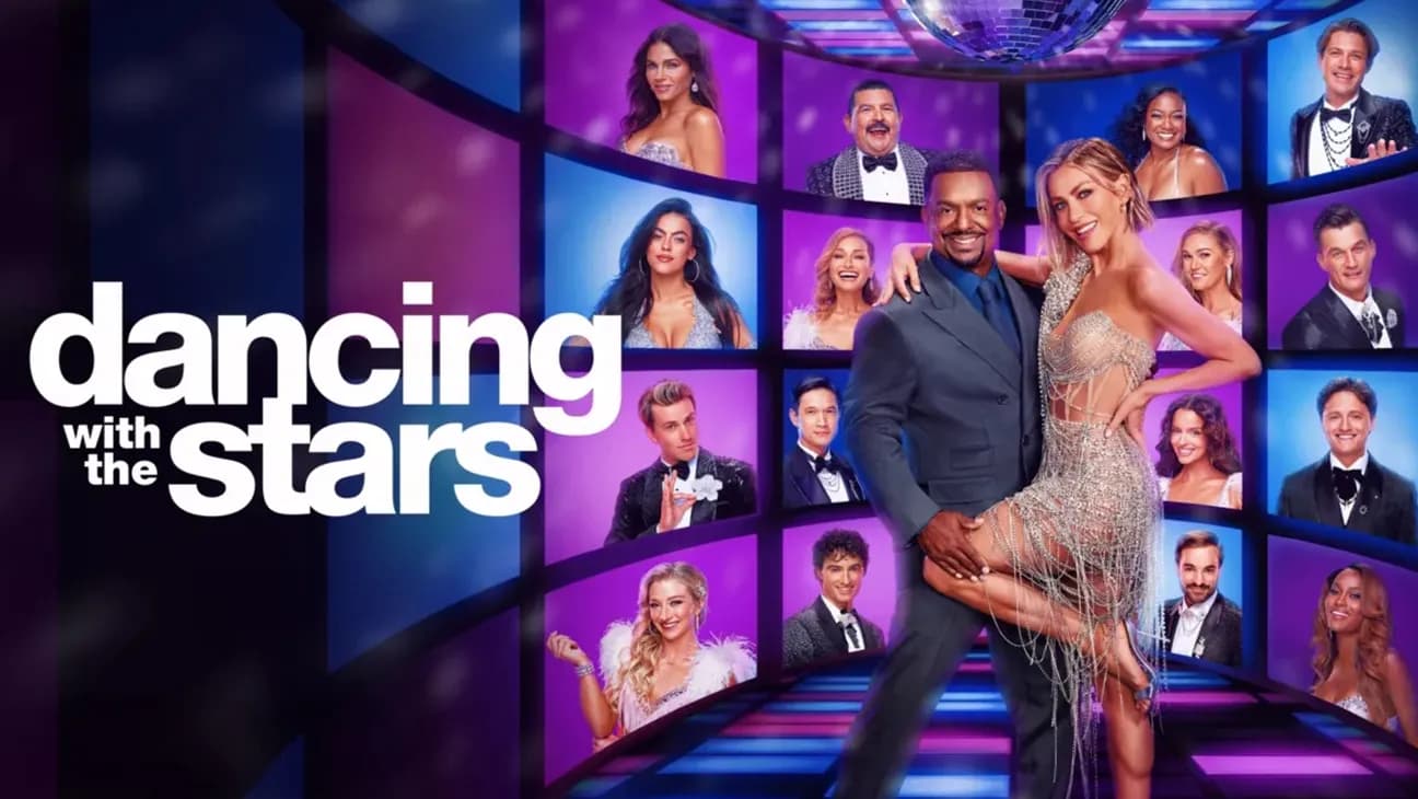 A Dancing With the Stars couple performing a ballroom routine on the Season 35 stage under bright lights.