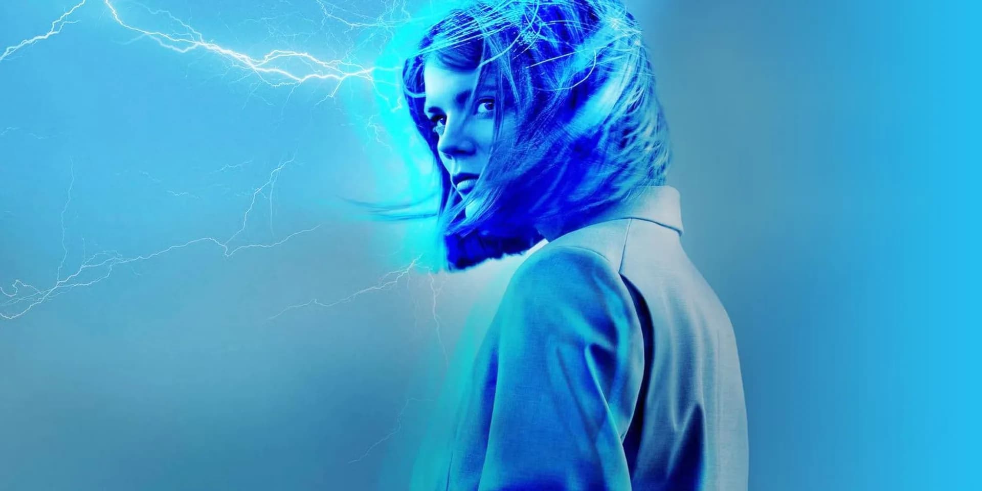 Emma Greenwell as Myfanwy Thomas standing on the Millennium Bridge, rain falling, eyes wide with confusion.
