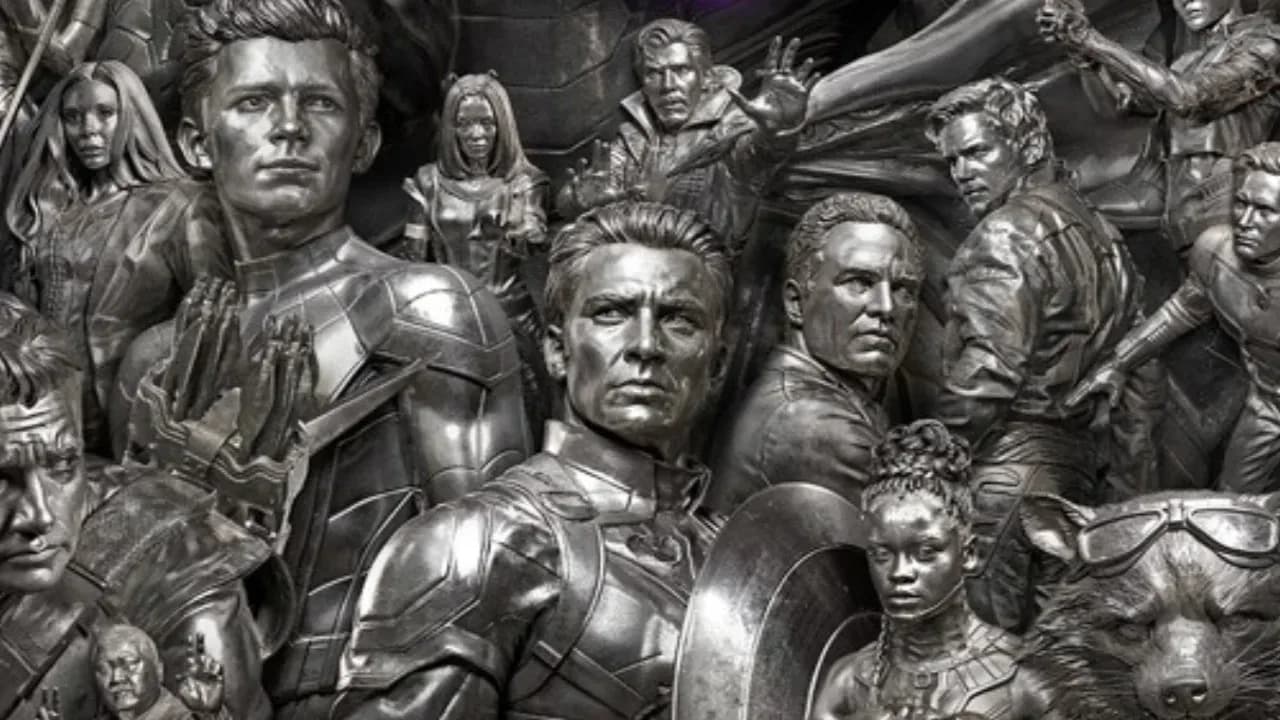 Poster of Avengers: Endgame displayed on an Indian cinema screen with crowds lining up to buy tickets
