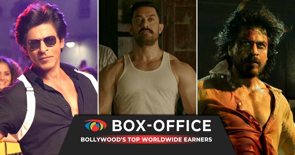 Aamir Khan in Dangal, holding a wrestler's belt, smiling under bright lights.