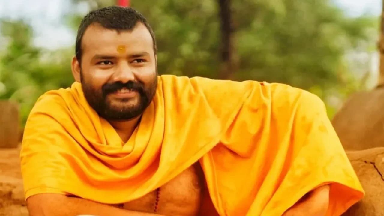 Hanuman Ansh theatrical poster showing lead actor in devotional pose with temple backdrop