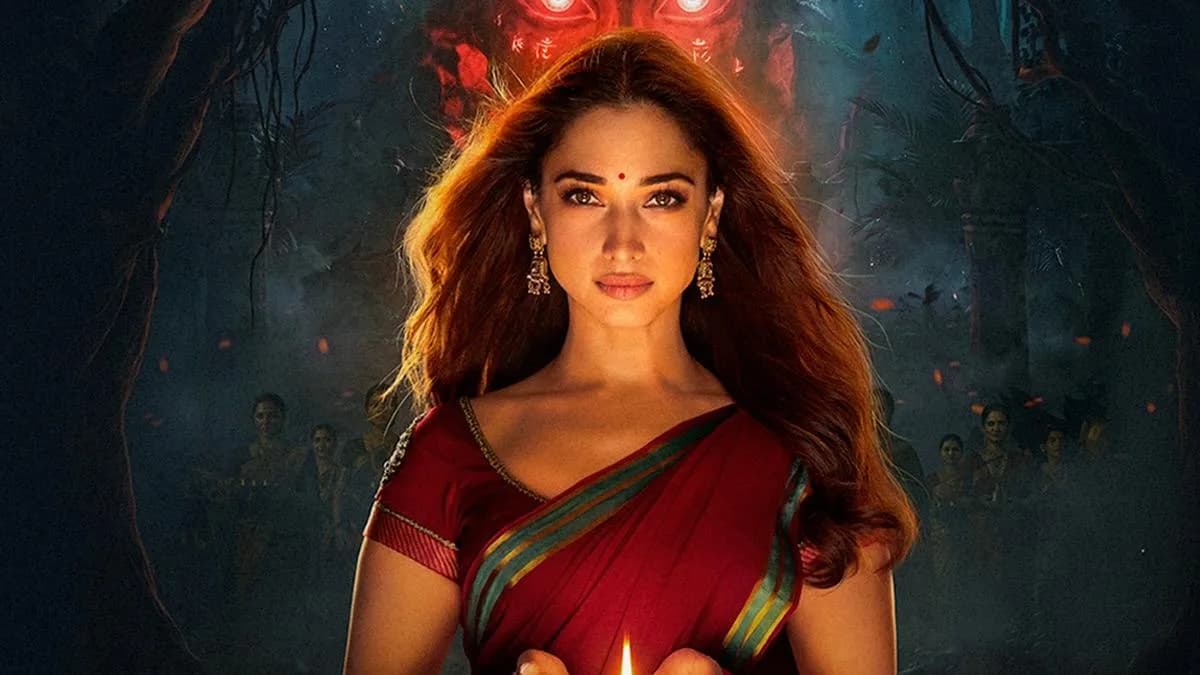 A still from The Vvaan featuring Tamannaah Bhatia and Sidharth Malhotra in a fantasy setting, glowing lights around them.