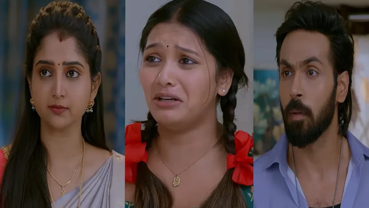 A tense scene from Brahmamudi: Raja clutching Siri as Indhu stands behind them, eyes sharp, while Rekha stares in disbelief.