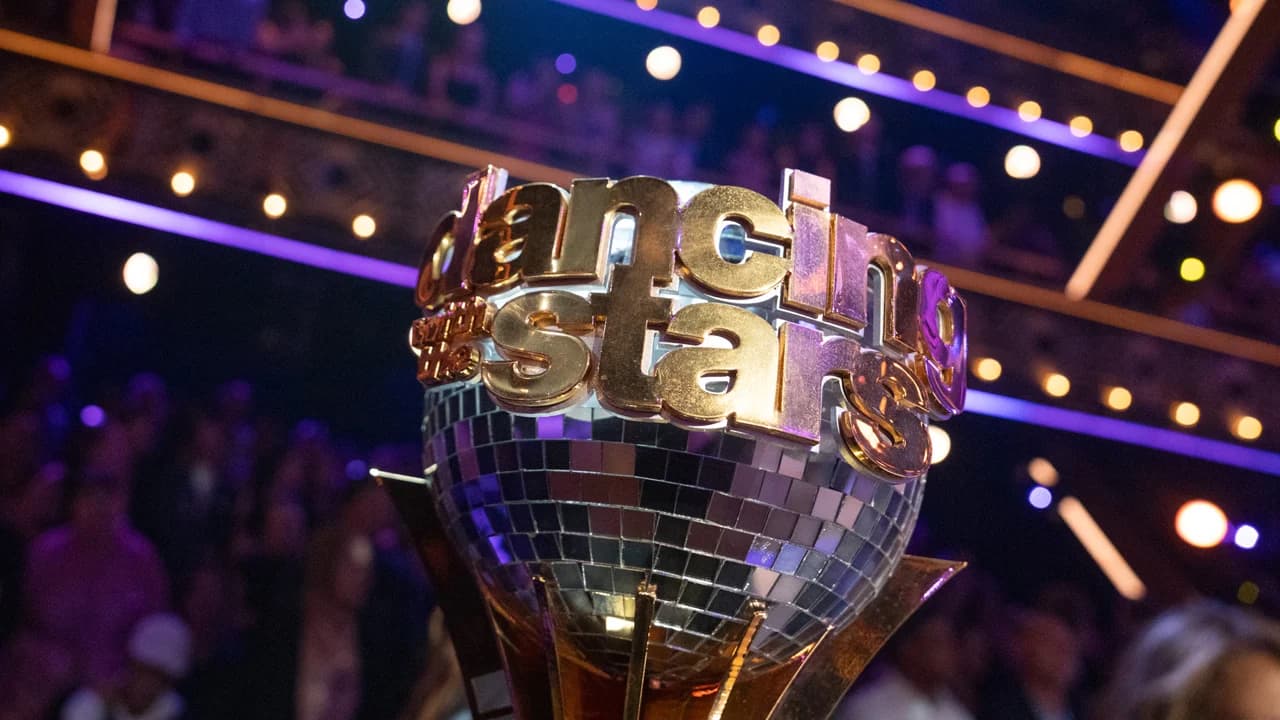 Dancing With the Stars judges' panel watching a couple perform during the season 35 premiere